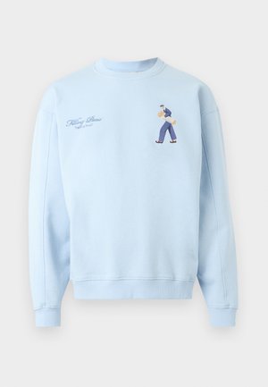 Light blue sweatshirt with embroidered walking man holding baguettes and text "Filling Pieces Baking Bread" on left chest.