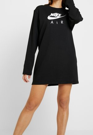Sort Nike-langærmet kjole med hvidt "AIR"-logo, med en afslappet pasform, rund hals og lige kant. Blødt stof med minimal syning.