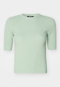 Haut à manches courtes en tricot côtelé vert clair avec un col rond. Texture douce et coupe ajustée, idéal pour un look décontracté. Étiquette de marque visible.