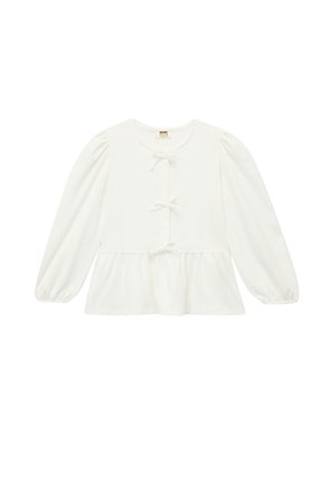 Biała bluzka z długim rękawem, wykonana z teksturowanej tkaniny. Posiada okrągły dekolt, zapięcie na guziki z detalami w postaci kokardek oraz peplum na dole.