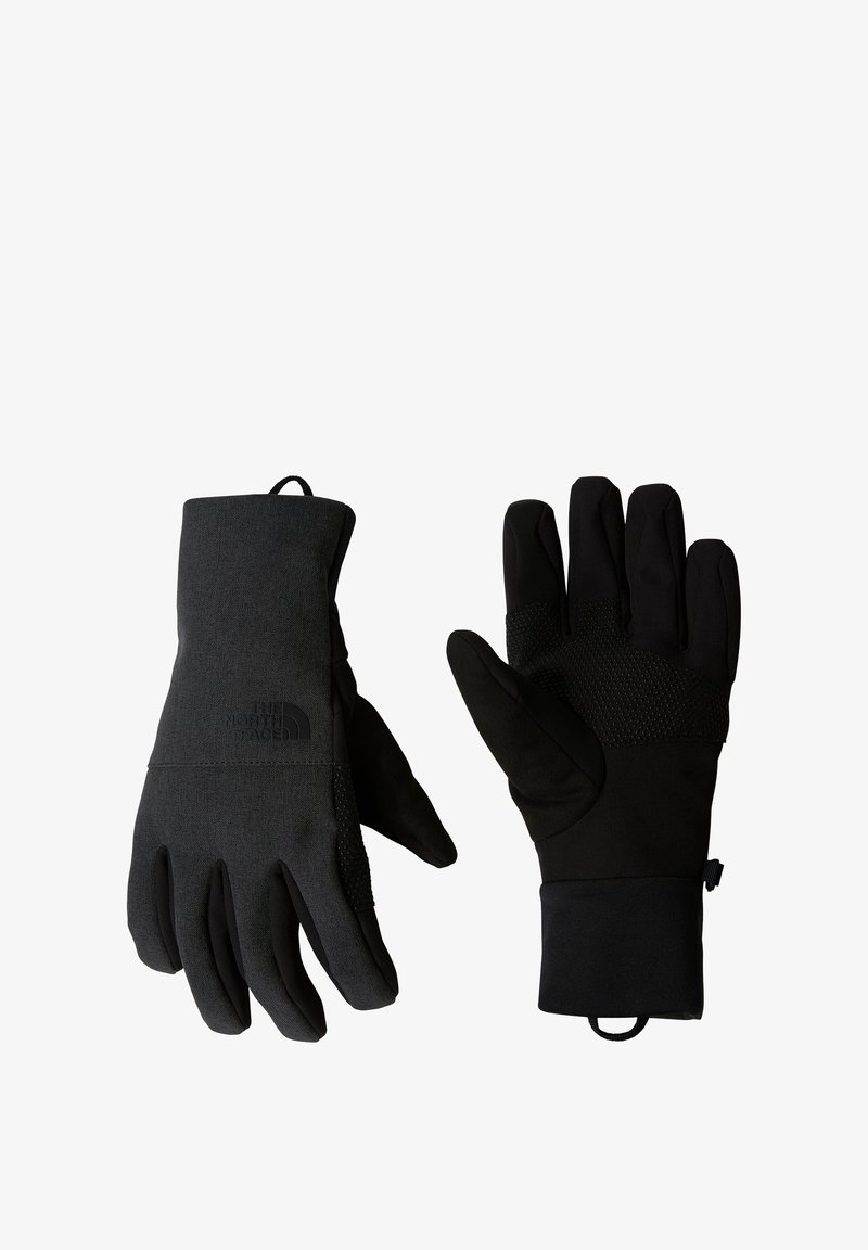 Czarne rękawice z teksturowanym materiałem na zewnątrz, gładką podszewką i palcami kompatybilnymi z ekranami dotykowymi. Mają ściśle dopasowane nadgarstki i detale z logo.