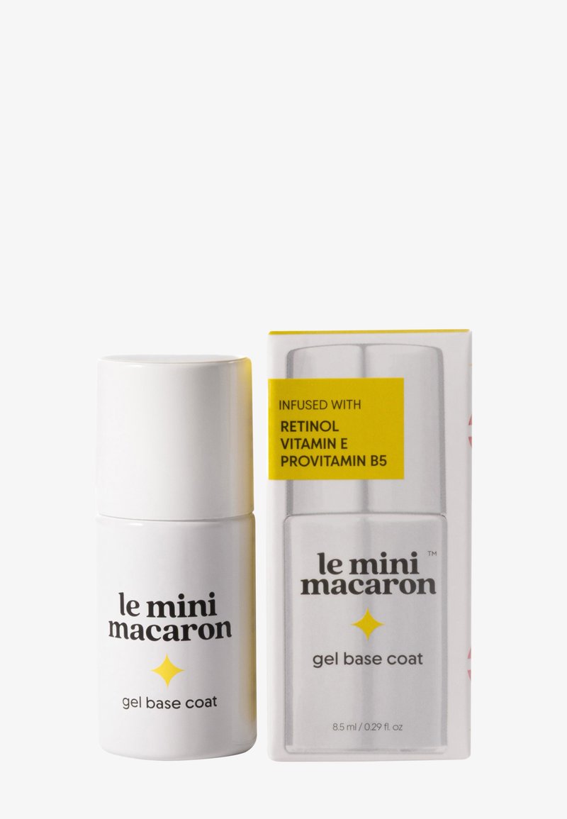 Flacon blanc et emballage du gel base coat Le Mini Macaron infusé au rétinol, vitamine E et provitamine B5, 8,5 ml.
