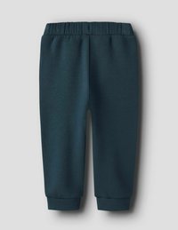 Ciemnozielone dziecięce spodnie dresowe na elastycznym pasku z ściągaczami, leżące płasko na jasnoszarym tle.