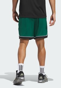 adidas Performance BADGE 9IN - Urheilushortsit - team dark green black