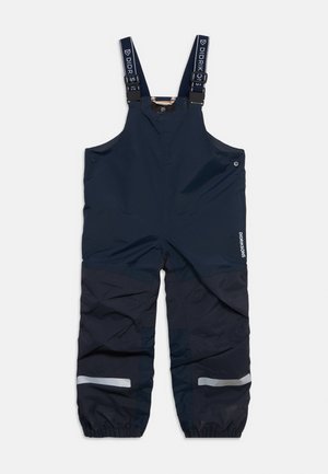 Marineblauwe waterdichte kinderoverall met verstelbare bretels met Didriksons-logo en reflecterende strepen op de onderbenen.