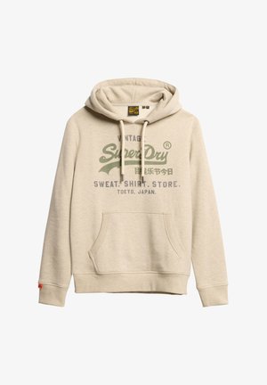 Beżowa bluza z kapturem, z kieszenią z przodu, kapturem ze sznurkiem i nadrukowanym tekstem. Posiada zielone i niebieskie grafiki, miękką fakturę oraz ściągacze na rękawach.