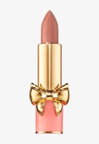 Lipstick with a pink and gold tube, featuring a textured gold bow accent. The bullet is a soft nude color with a pointed tip.