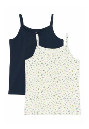 To ærmeløse tanktops, den ene ensfarvet mørkeblå og den anden hvid med et lille multifarvet blomsterprint, lagt overlappende på en hvid baggrund.