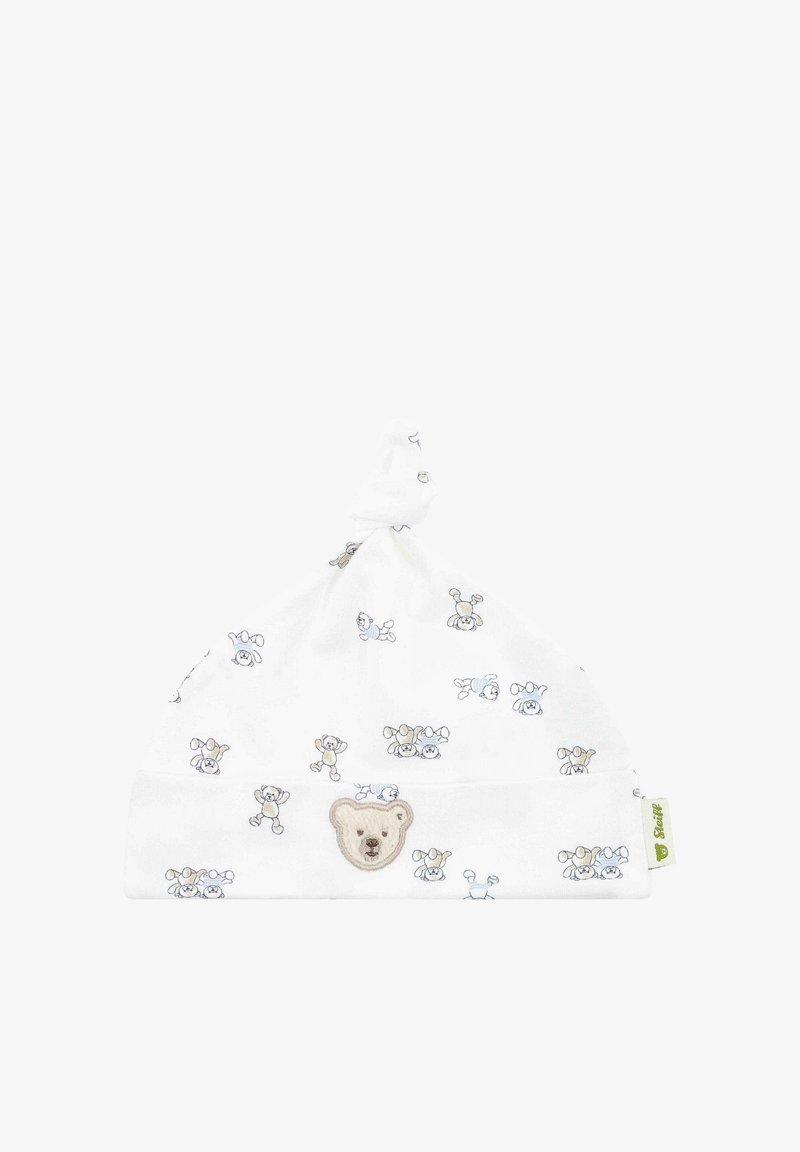 Biała bawełniana czapka dla niemowląt z motywem misia, z węzłem na górze oraz nadrukowanym wzorem teddy bear w stonowanych kolorach. Miękka tekstura.