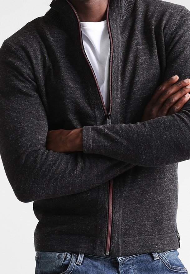 Dark gray knit sweater with a high collar, zip front, and marled texture. Features contrasting burgundy zipper and fitted design.