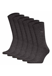 Conjunto de calcetines de algodón gris, con puño acanalado, textura suave y un pequeño logo. Seis pares exhibidos en una disposición apilada.