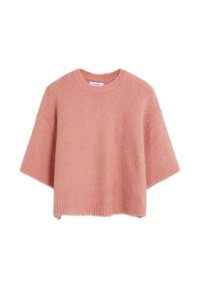 Jersey rosa, de corte holgado y mangas cortas, hecho de tela suave y texturizada. Presenta un escote redondeado y un dobladillo acanalado en la parte inferior.