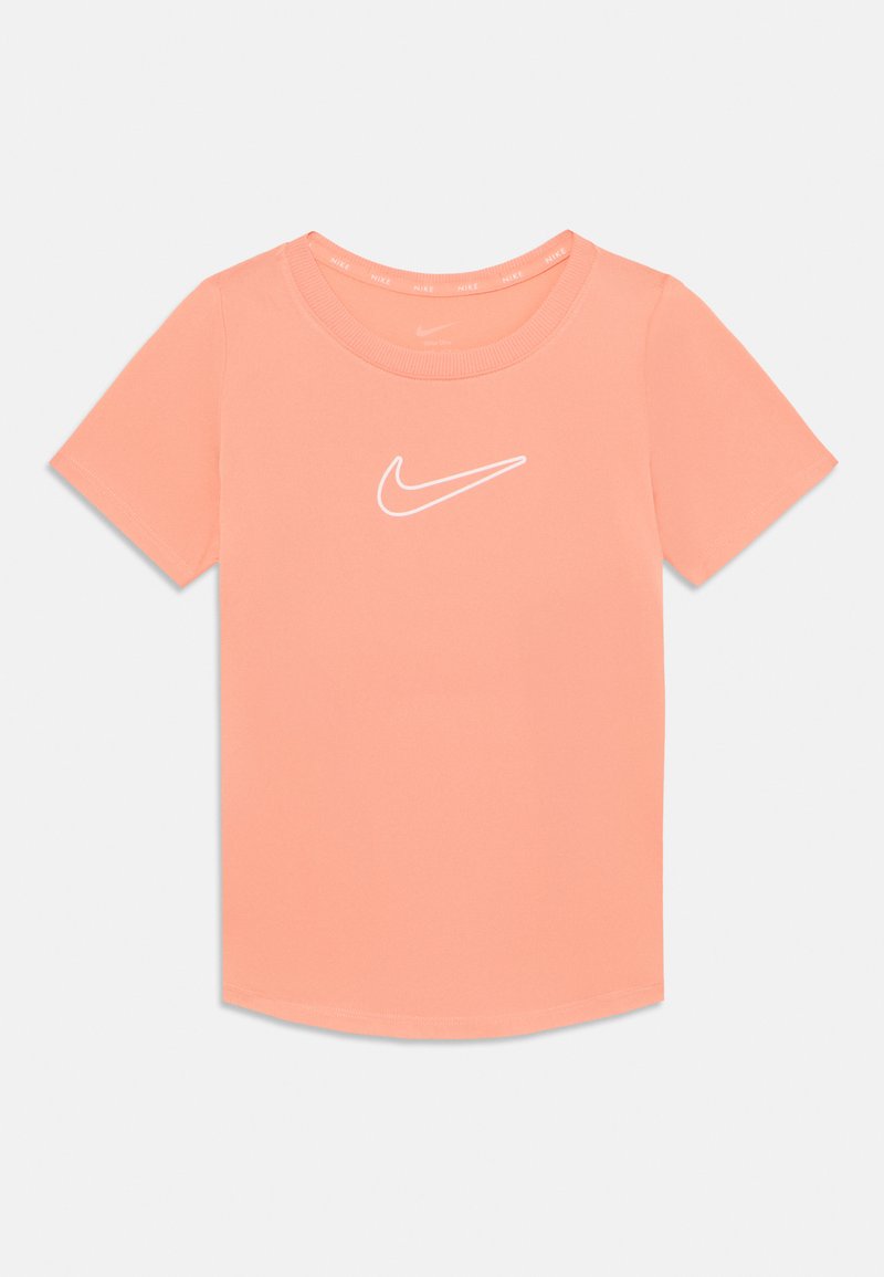 Camiseta de Nike de color melocotón con mangas cortas y escote redondo, y un logo blanco de Nike en el pecho. Tejido suave, ajuste casual y dobladillo recto.