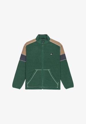 Green fleece jacket with a front zipper, featuring beige and dark blue accent panels. Includes two front pockets and white stitching details.