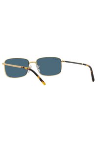 Occhiali da sole rettangolari con lenti blu scuro, montatura in metallo dorato e bracci dal motivo tartarugato. Naselli regolabili per il comfort.