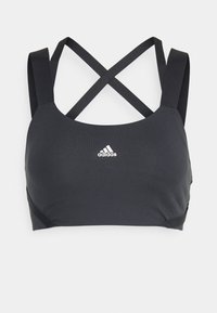Sutiã atlético preto com um tecido liso e elástico. Apresenta alças largas em cruz e um pequeno logotipo branco na frente.