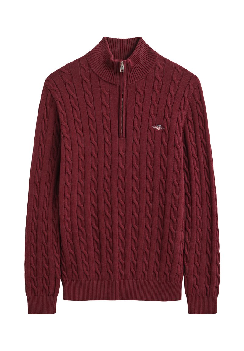 Maroon cable knit sweater with ribbed collar, half-zip closure, long sleeves, and a small embroidered logo on the chest.