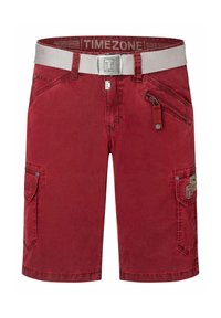 Red cotton shorts featuring a silver buckle belt, multiple pockets, and embroidered logo details. Smooth texture with a relaxed fit.