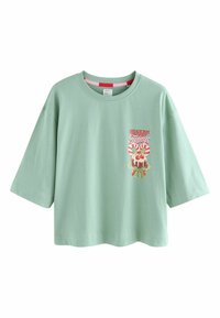 Light green short-sleeve t-shirt featuring a colorful cupcake graphic on the front. Soft cotton fabric with a relaxed fit and crew neckline.