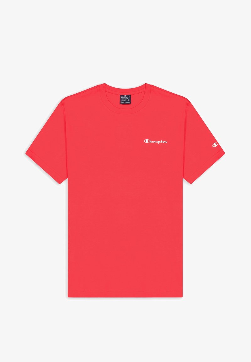 T-shirt rouge à manches courtes de la marque Champion avec logo blanc sur la poitrine et la manche, col rond et étiquette de taille moyenne à l'intérieur du col.