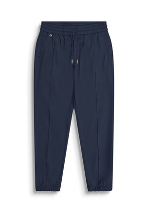 Pantaloni jogger blu navy a gamba affusolata con vita e polsini elasticizzati, tasche laterali e chiusura frontale con coulisse.