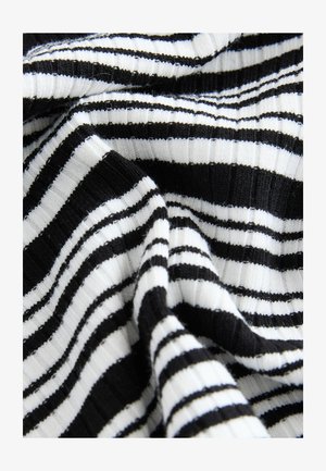 Black and white striped fabric with a ribbed texture; alternating wide and narrow stripes create a bold pattern.