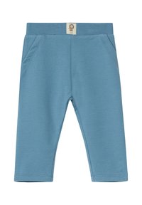 Blauwe katoenen leggings met een zachte textuur, voorzien van een ribbelband, twee zijzakken en een klein label met een leeuwontwerp.