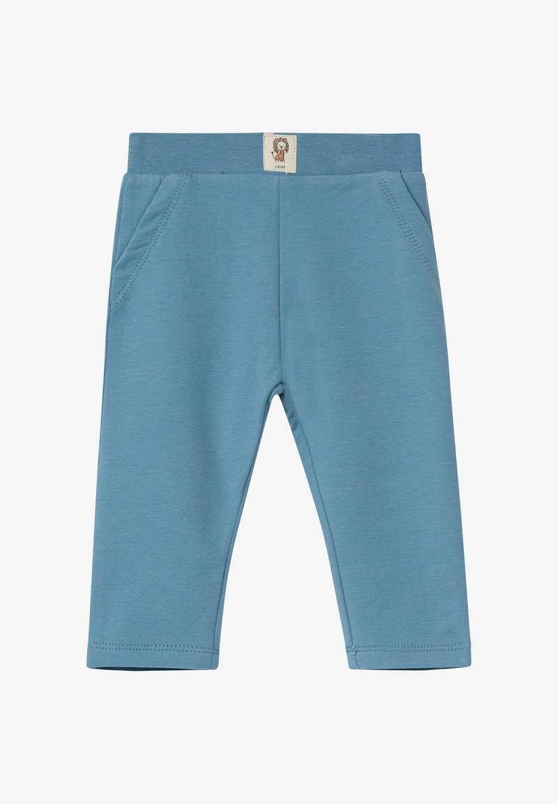 Blauwe katoenen leggings met een zachte textuur, voorzien van een ribbelband, twee zijzakken en een klein label met een leeuwontwerp.