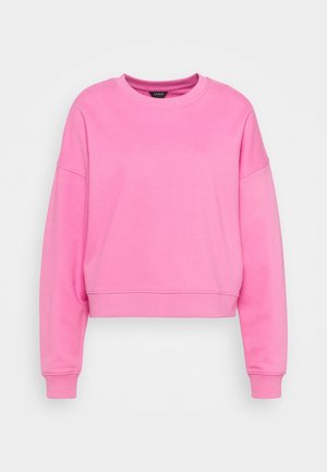 Pink cropped sweatshirt made of soft fabric, featuring a round neck, dropped shoulders, and ribbed cuffs. Smooth texture and minimal detailing.