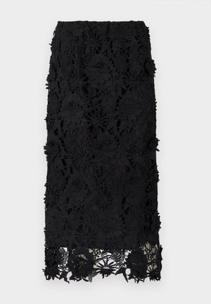 Sort blond skirt med intrikate blomsterbroderier og en bølget kant. Materialet er letvægts med en struktureret overflade.