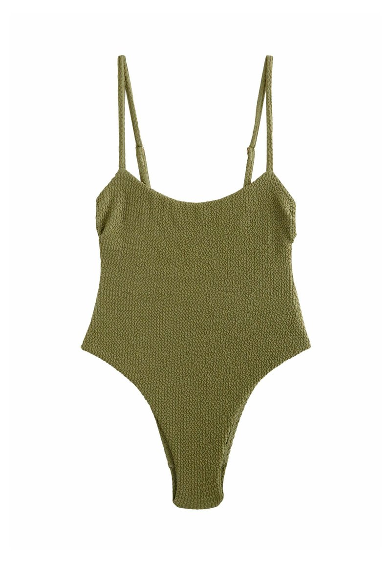 Maillot de bain une pièce en tricot vert olive avec de fines bretelles réglables et une coupe haute au niveau des jambes. Tissu texturé avec un motif subtil.