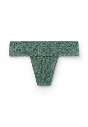 Krajkový tanga v tlumené zelené barvě s květinovým vzorem a vlnitými okraji na pase, s hladkým povrchem na těle.