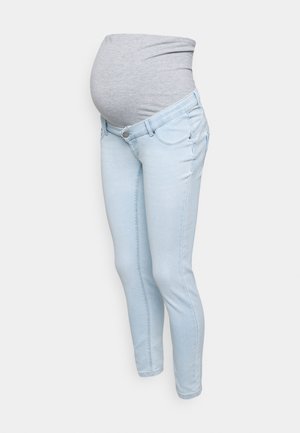 Trudničke traperice svijetloplavog denima s rastezljivim sivim pojasom. Uski kroj s prednjim džepovima i minimalnim šavovima.