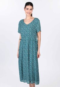 Blumiges, petrolfarbenes Midikleid mit V-Ausschnitt, kurzen Ärmeln und einer Kordelzug-Taillierung. Leichter Stoff mit fließender Textur.