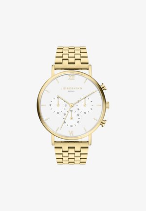 Guldtonet kronografur med en hvid urskive, tre subdials og en mesh-rem. Viser romertal XII og VI.