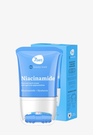 Blue plastic container with a white label. Contains niacinamide face and neck cream, features a massage roller on the bottom. Box included.