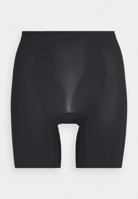 Shorts noirs en tissu élastique avec une texture lisse, présentant un design découpé au centre. Pas de coutures ni de motifs visibles.