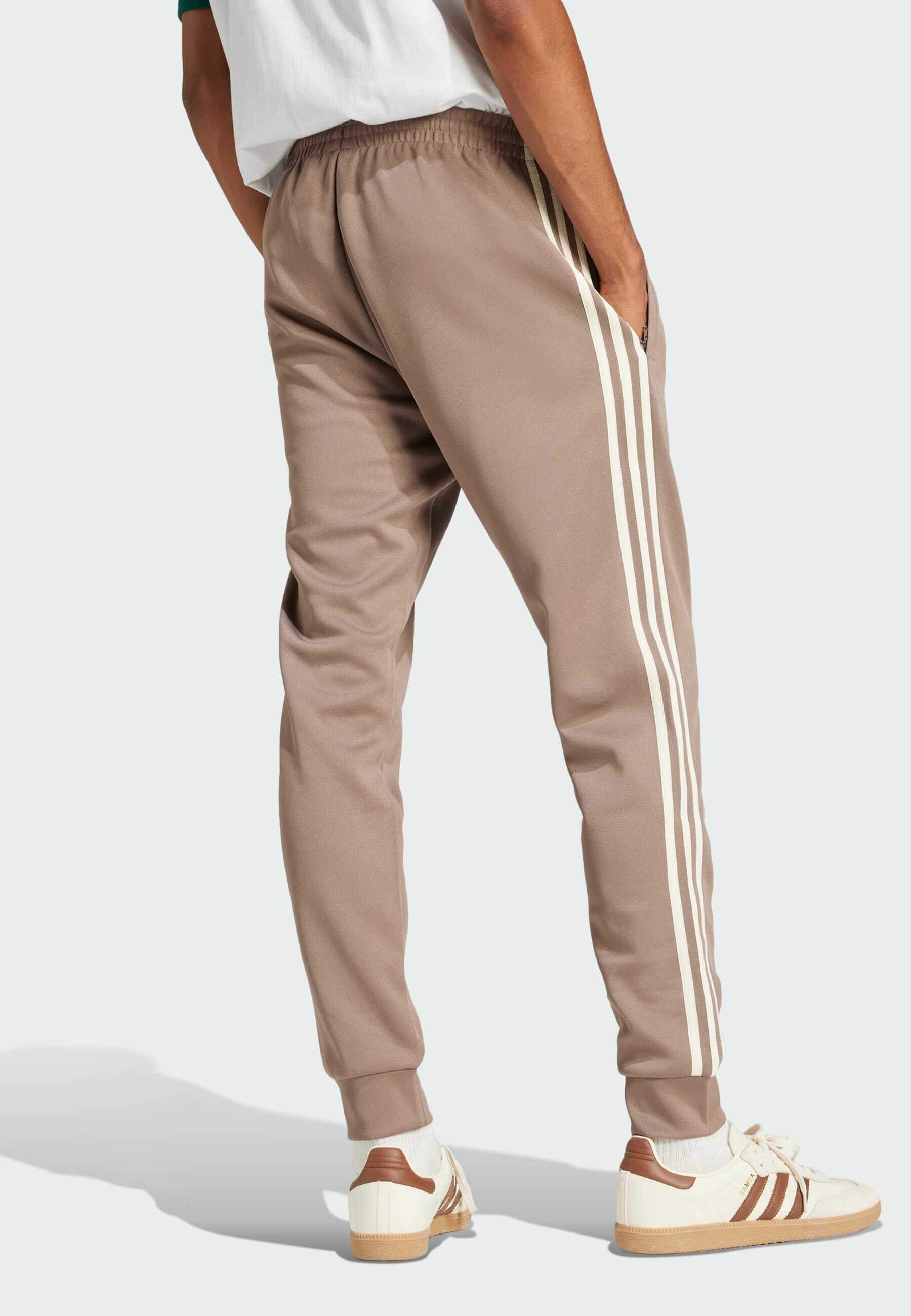 adidas Originals SST TP - Tracksuit bottoms - trace brown/brown