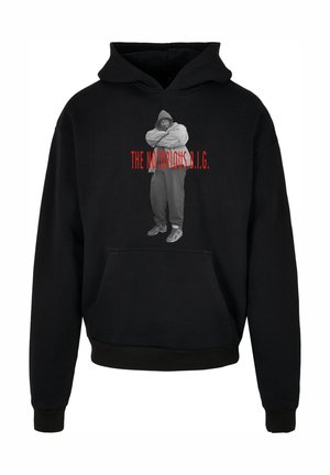 Schwarzer Hoodie mit einer vorderen Tasche, der ein graues Bild einer Person mit dem Text "THE NOTORIOUS B.I.G." in Rot zeigt. Standard-Pullover-Design.