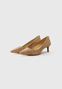 Pair of beige suede pointed-toe kitten heel shoes on white background, viewed from the side and slightly above.