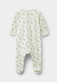 Kojenecký overal z bavlny v krémové barvě s hravým vzorem balónků, zmrzlinových kornoutů a mraků; má dlouhé rukávy a zapínání na patentky.