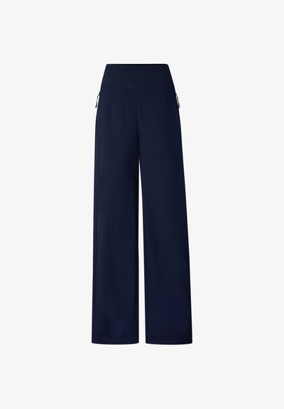 Marineblaue Hose mit weitem Bein, hohem Bund und Reißverschlusstaschen an den Seiten, entworfen für Freizeit oder Arbeitskleidung.