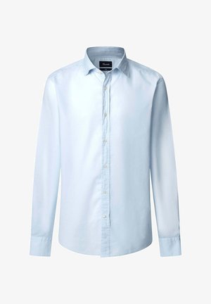 Camicetta azzurro chiaro a maniche lunghe in cotone, con apertura frontale a bottoni, colletto classico e orlo arrotondato. Design minimalista.