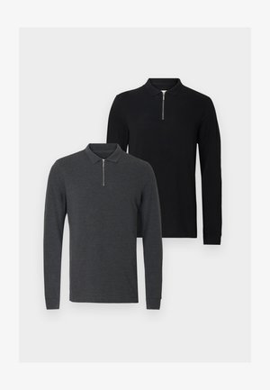 Kaksi pitkähihainen poolopaitaa: yksi tummanharmaa vetoketjullisella kauluksella ja yksi yksivärinen musta, molemmissa klassinen istuvuus ja pehmeä materiaali.