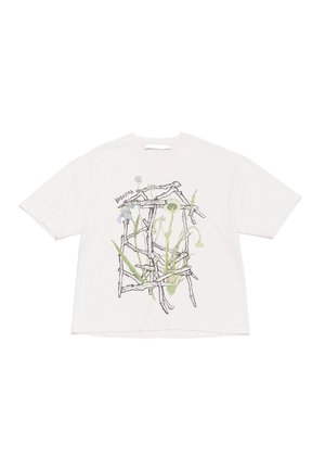 White cotton t-shirt featuring a colorful graphic of sticks and plants, including green and blue accents, with short sleeves and a loose fit.