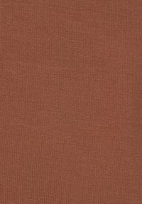 Knit fabric in a warm terracotta color, featuring a smooth texture with a fine rib pattern throughout.