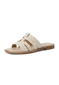 Beige slip-on sandal with three wide straps, a crossed design detail, and a tan sole. Smooth leather texture and minimalistic appearance.