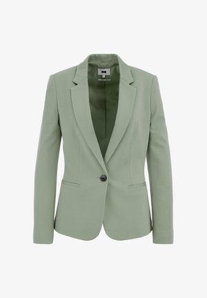 Sacou verde deschis cu rever la ciucure, închidere cu un singur nasture, două buzunare frontale și o textură netedă. Interior căptușit într-o nuanță mai închisă.