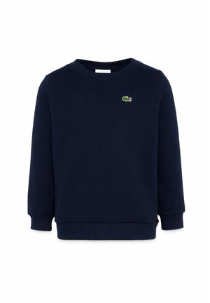 Felpa blu navy a maniche lunghe con scollo a girocollo, polsini e orlo a costine, con un piccolo logo di coccodrillo verde sul petto sinistro.