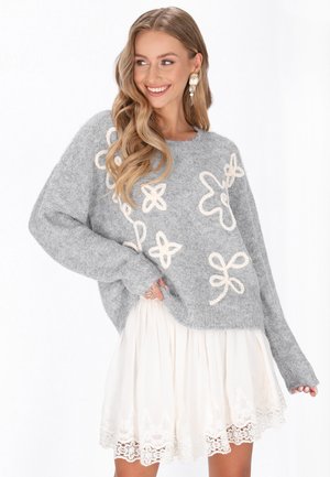 - Sweter